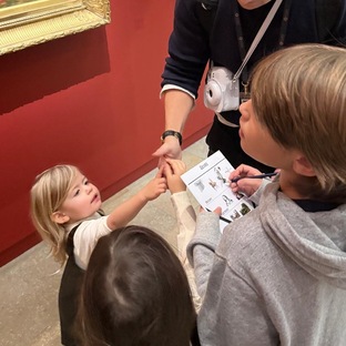 children having fun at the orsay museum doing the activity