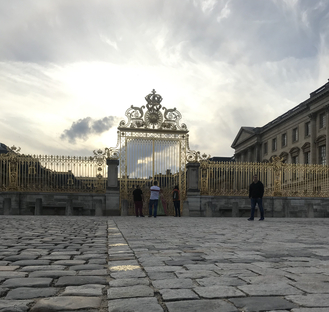 this is a great perspective and the grand gate of the versailles golden entrance