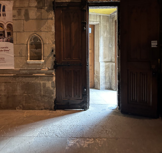 a gate opening at the back of the saint severin church in the latin quarter of Paris this is an invitation to expore