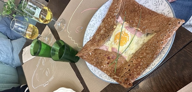 a crepe with a sunny side egg on it