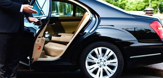 a driver inviting you inside his amazing mercedes