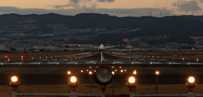 we see a plan taking of the ground from the airport